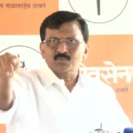 Shiv Sena (UBT) leader Sanjay Raut addressing a press conference while making a statement and pointing towards the audience.