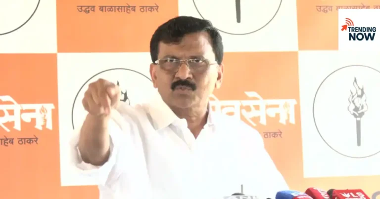 Shiv Sena (UBT) leader Sanjay Raut addressing a press conference while making a statement and pointing towards the audience.